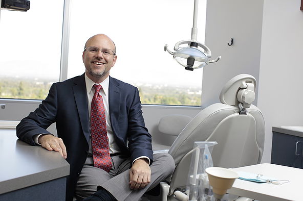 Dr. Ron Koslowski smiling in patient room